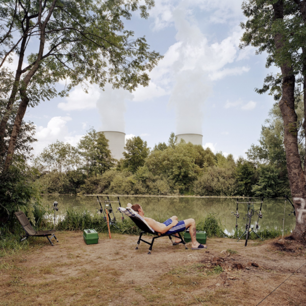 Photo d'un homme au bord d'un lac par Jürgen Nefzger